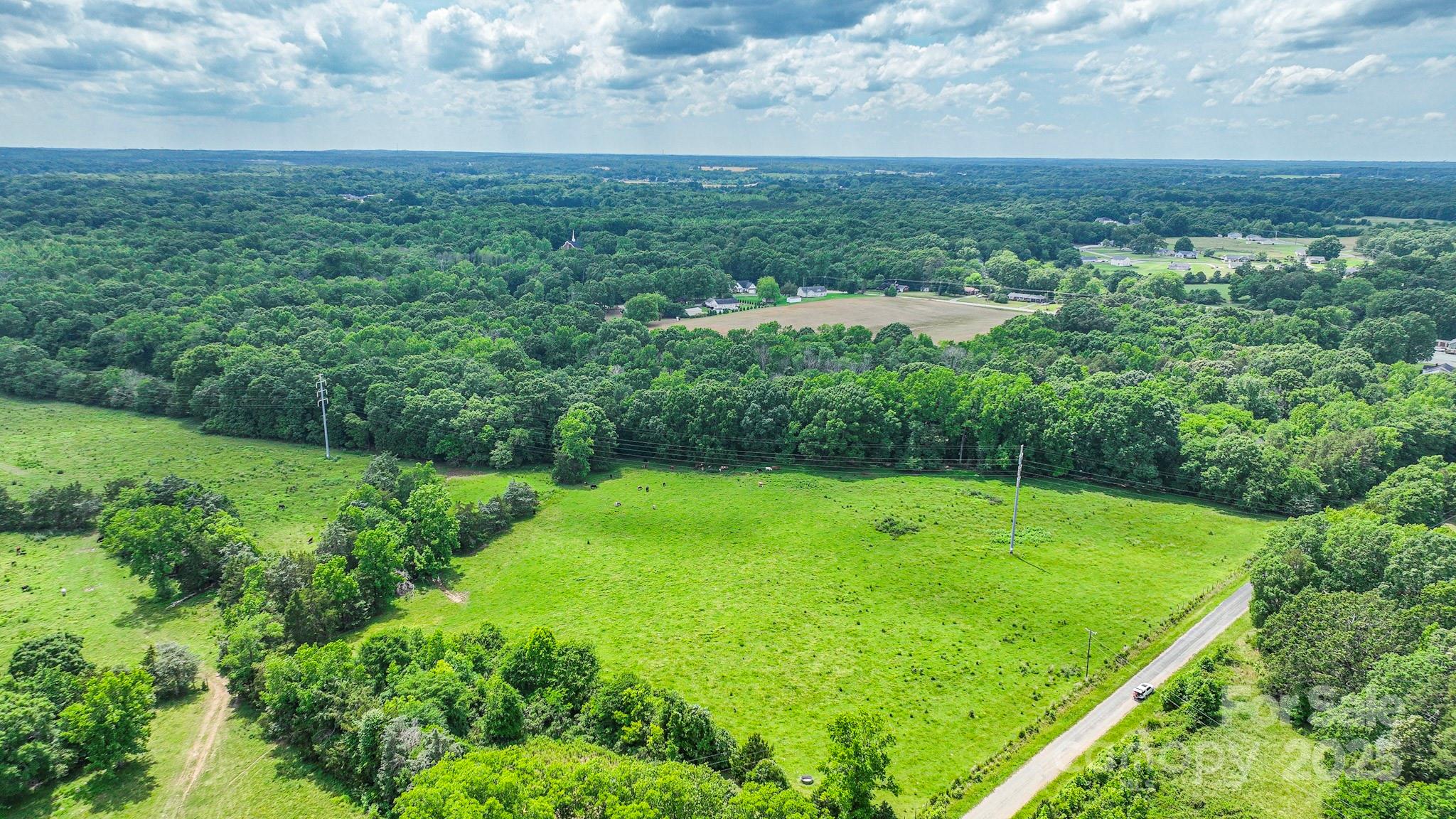 0 Avery Parker Road Monroe, NC 28112 - Photo 3 of 15 a view of a big yard with lots of green space