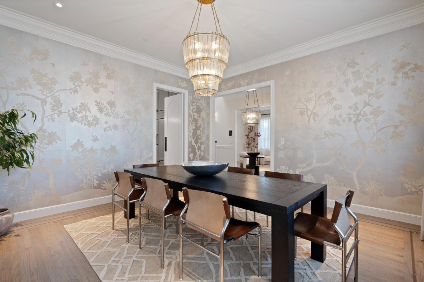 1153 Cabrillo Avenue Burlingame, CA 94010 - Photo 11 of 80 a view of a dining room with furniture and wooden floor