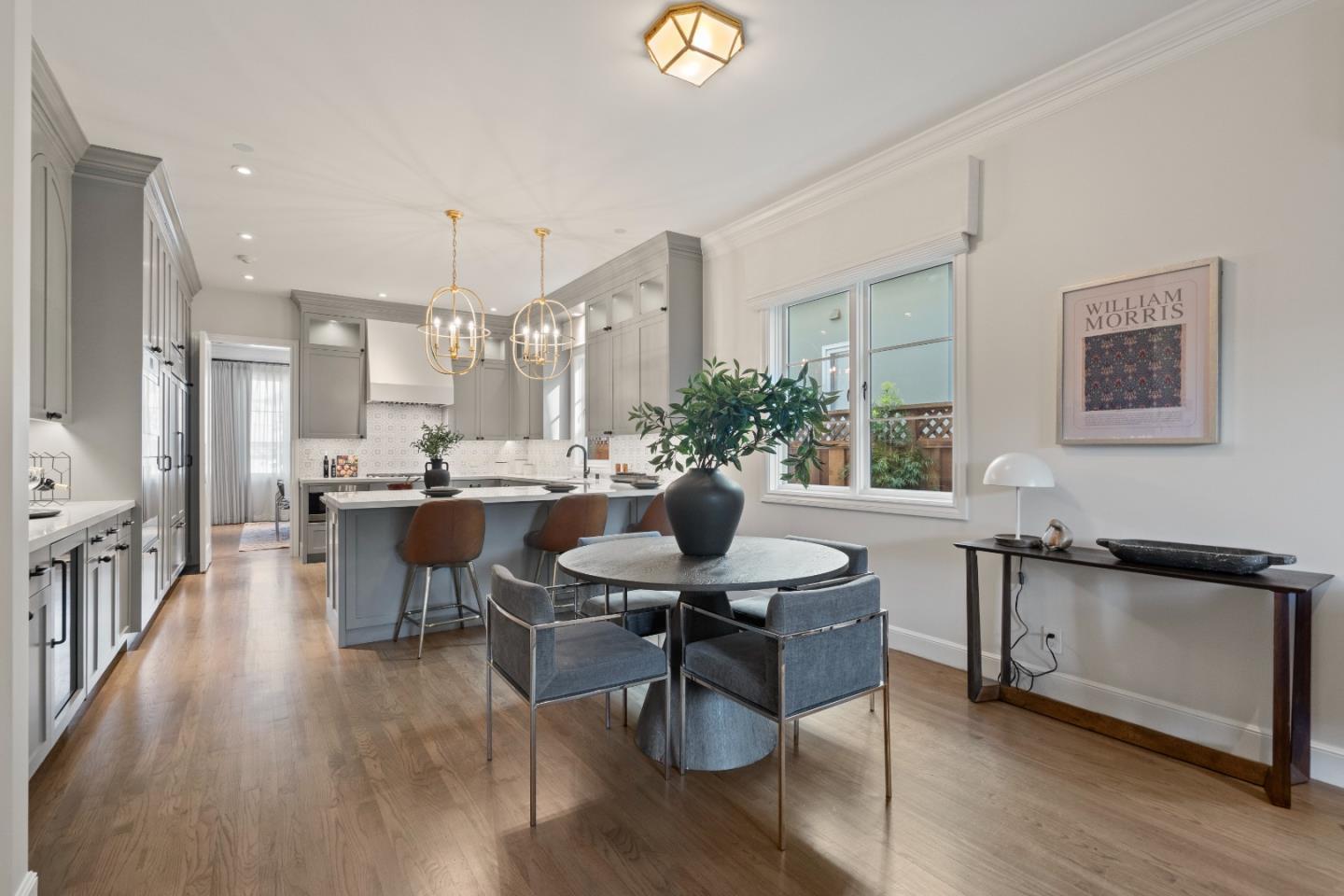 1153 Cabrillo Avenue Burlingame, CA 94010 - Photo 19 of 80 a view of a dining room with furniture and wooden floor