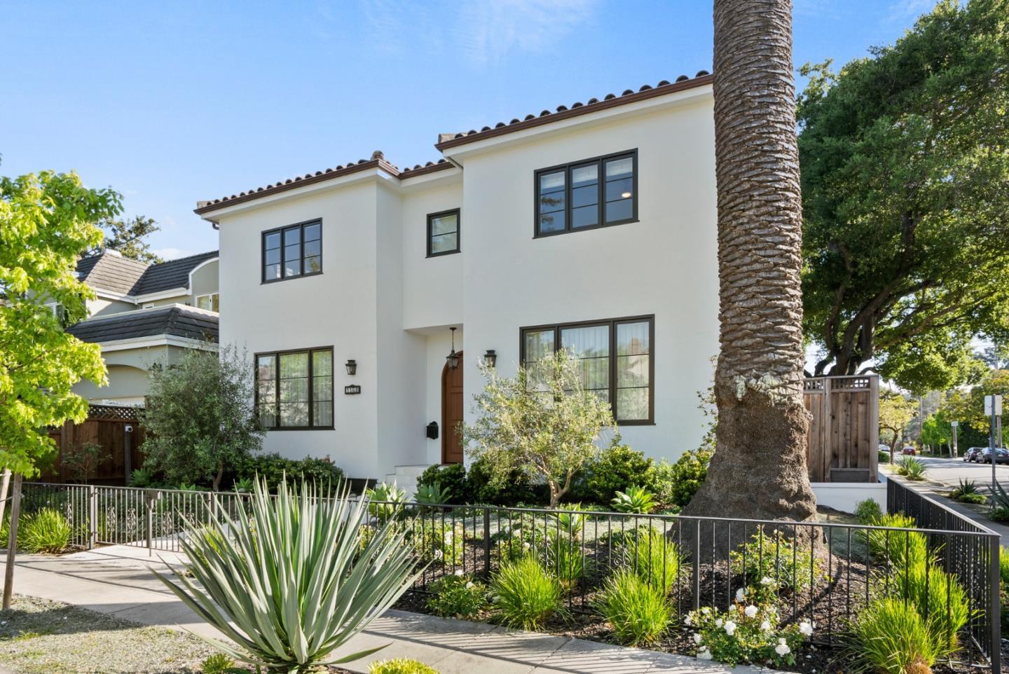 1153 Cabrillo Avenue Burlingame, CA 94010 - Photo 2 of 80 a front view of a house with a garden