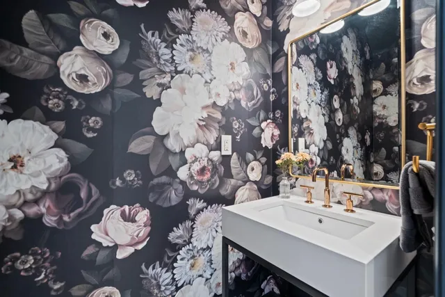 a bedroom with a bed and a table