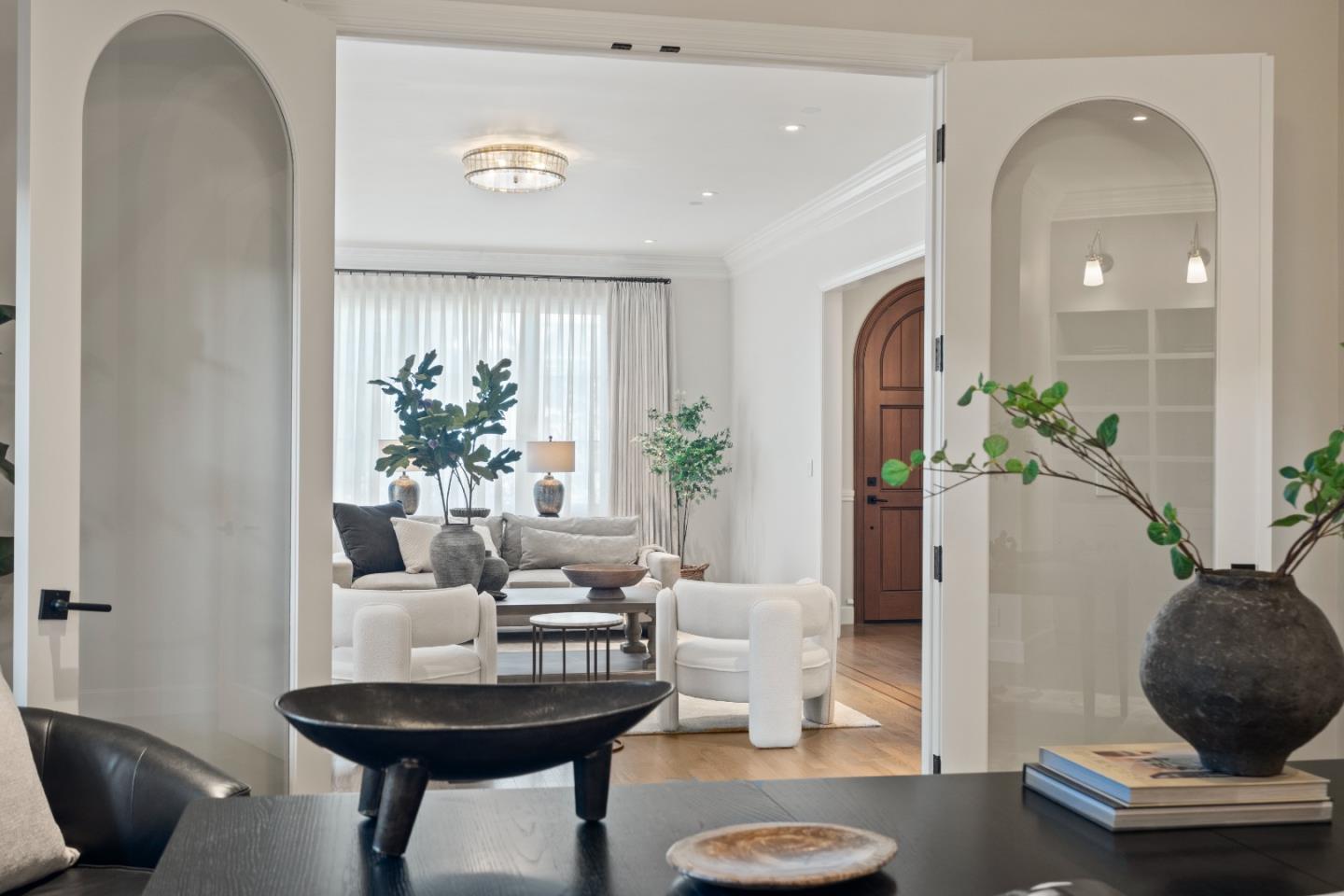 1153 Cabrillo Avenue Burlingame, CA 94010 - Photo 30 of 80 a living room with furniture and a potted plant