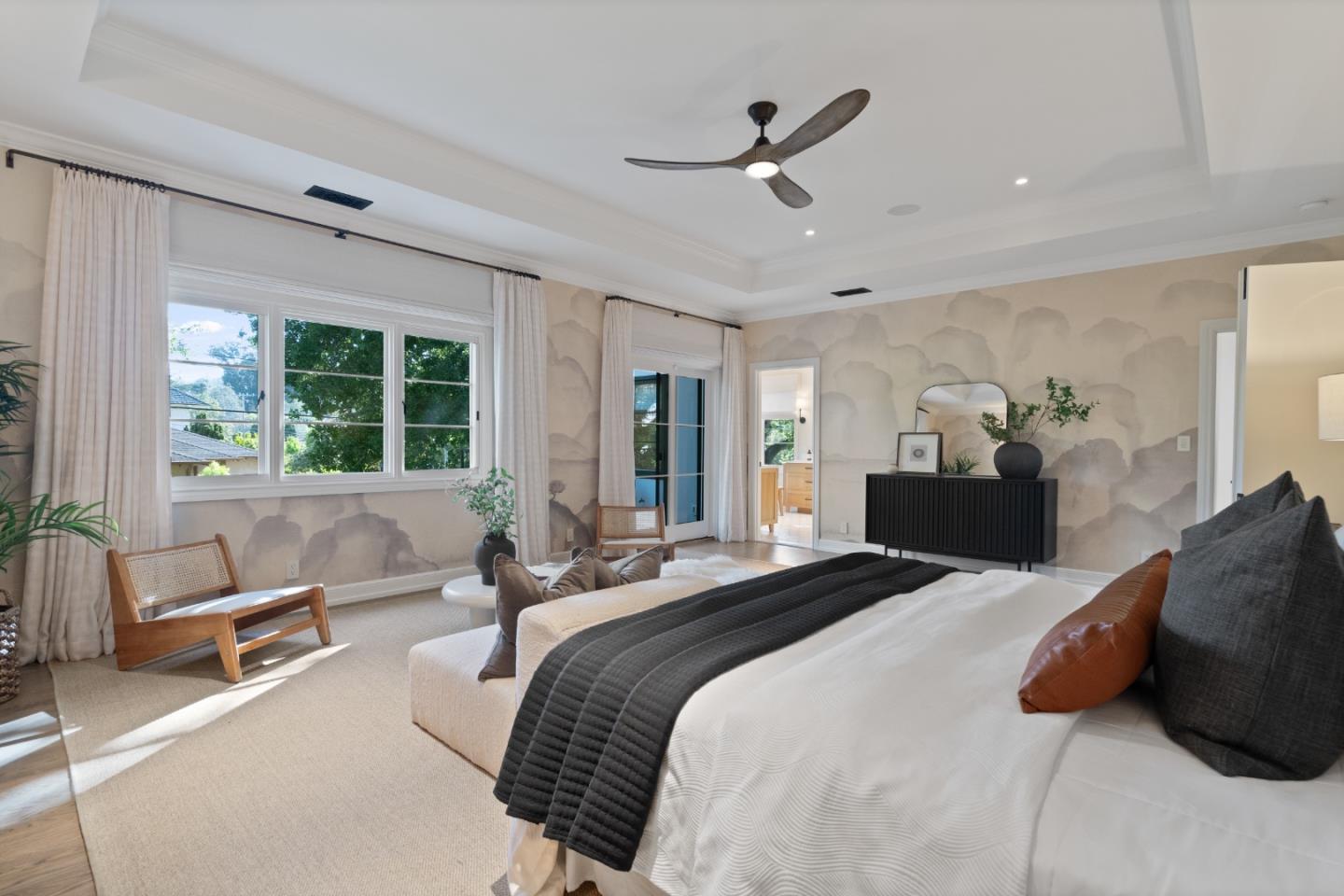 1153 Cabrillo Avenue Burlingame, CA 94010 - Photo 38 of 80 a spacious bedroom with a bed a couch and a large window