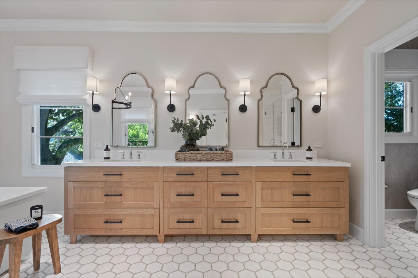 1153 Cabrillo Avenue Burlingame, CA 94010 - Photo 42 of 80 a bathroom with a granite countertop sink mirror and window