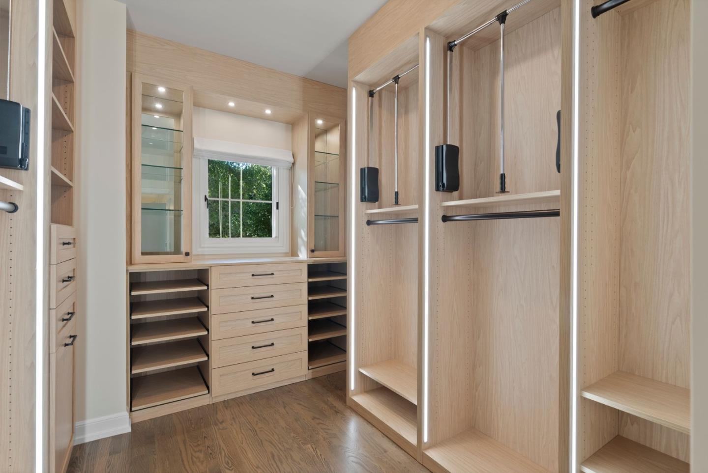 1153 Cabrillo Avenue Burlingame, CA 94010 - Photo 44 of 80 a view of walk in closet with empty racks
