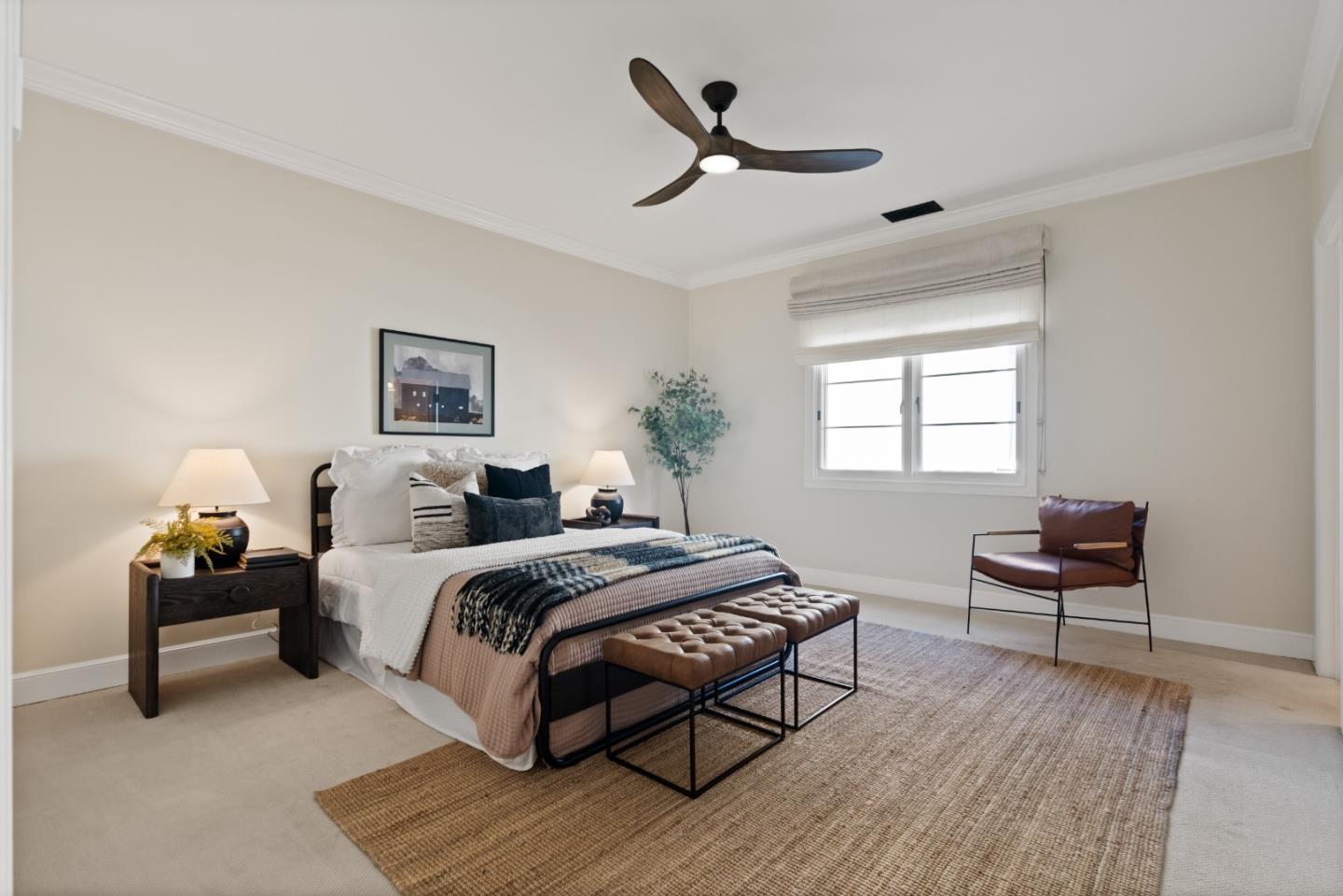 1153 Cabrillo Avenue Burlingame, CA 94010 - Photo 55 of 80 a spacious bedroom with a bed a chandelier and a window