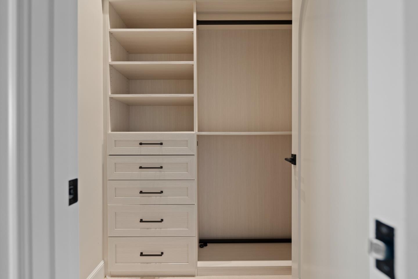 1153 Cabrillo Avenue Burlingame, CA 94010 - Photo 59 of 80 a view of walk in closet with empty racks