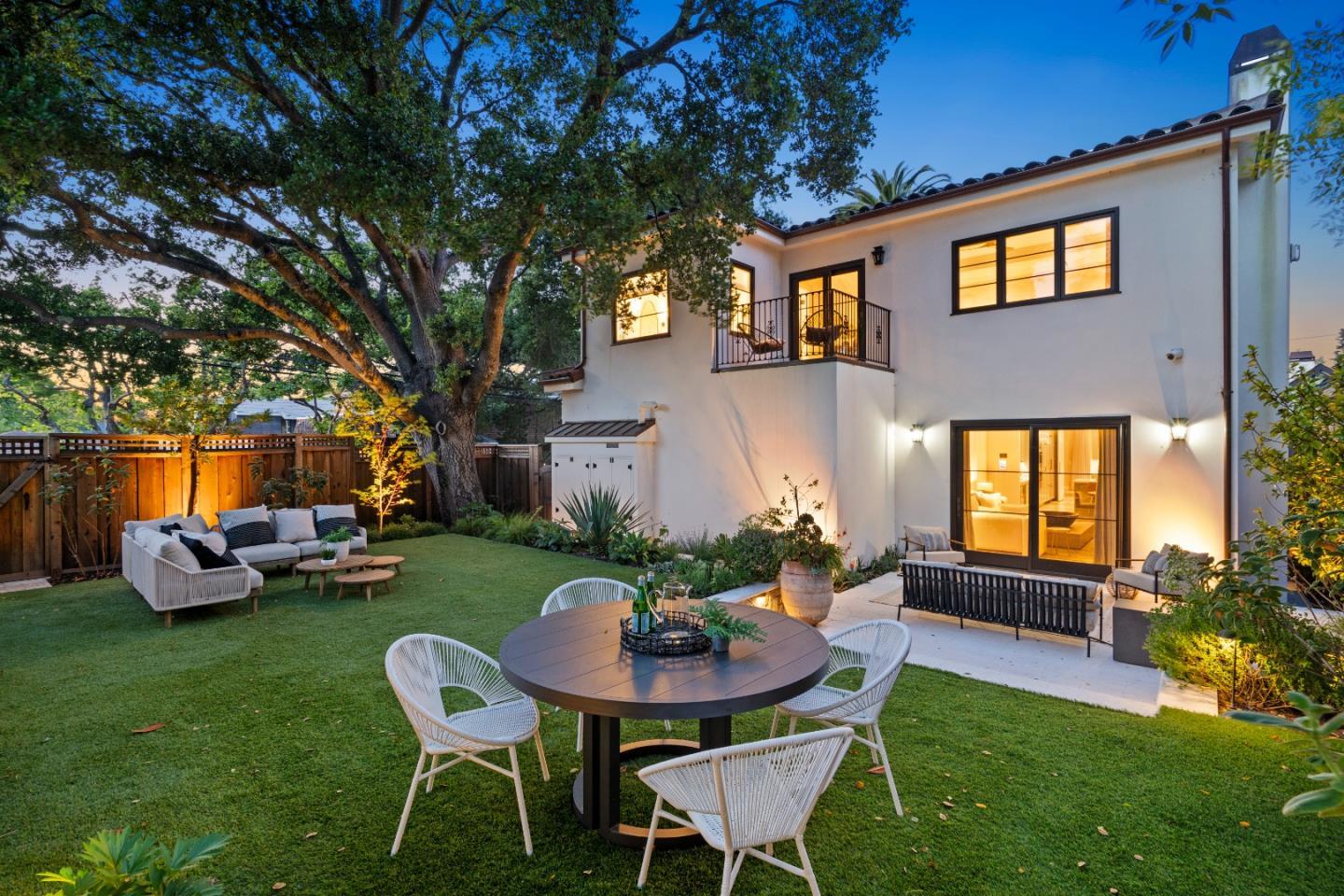 1153 Cabrillo Avenue Burlingame, CA 94010 - Photo 73 of 80 a backyard of a house with table and chairs