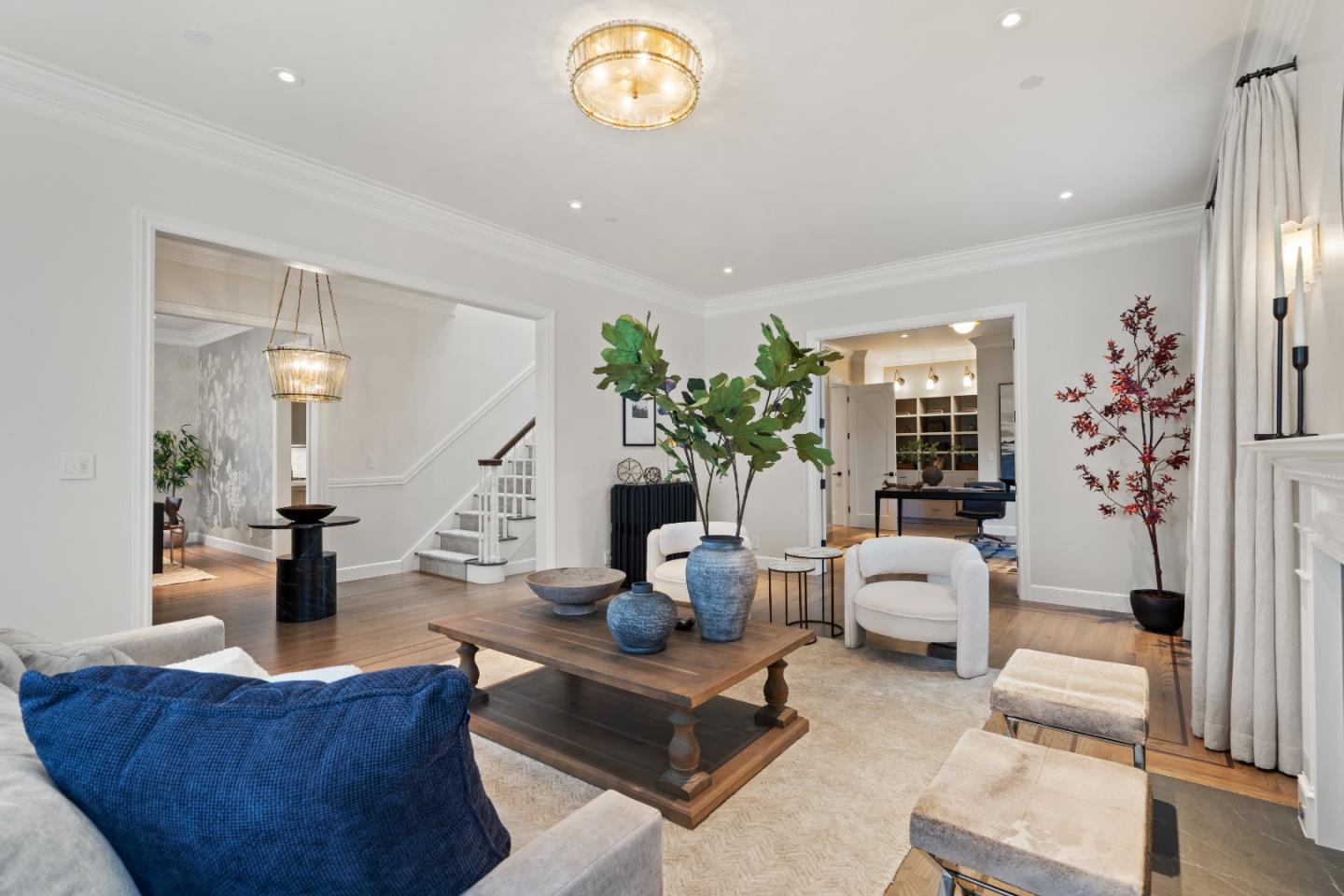 1153 Cabrillo Avenue Burlingame, CA 94010 - Photo 9 of 80 a living room with furniture and a chandelier