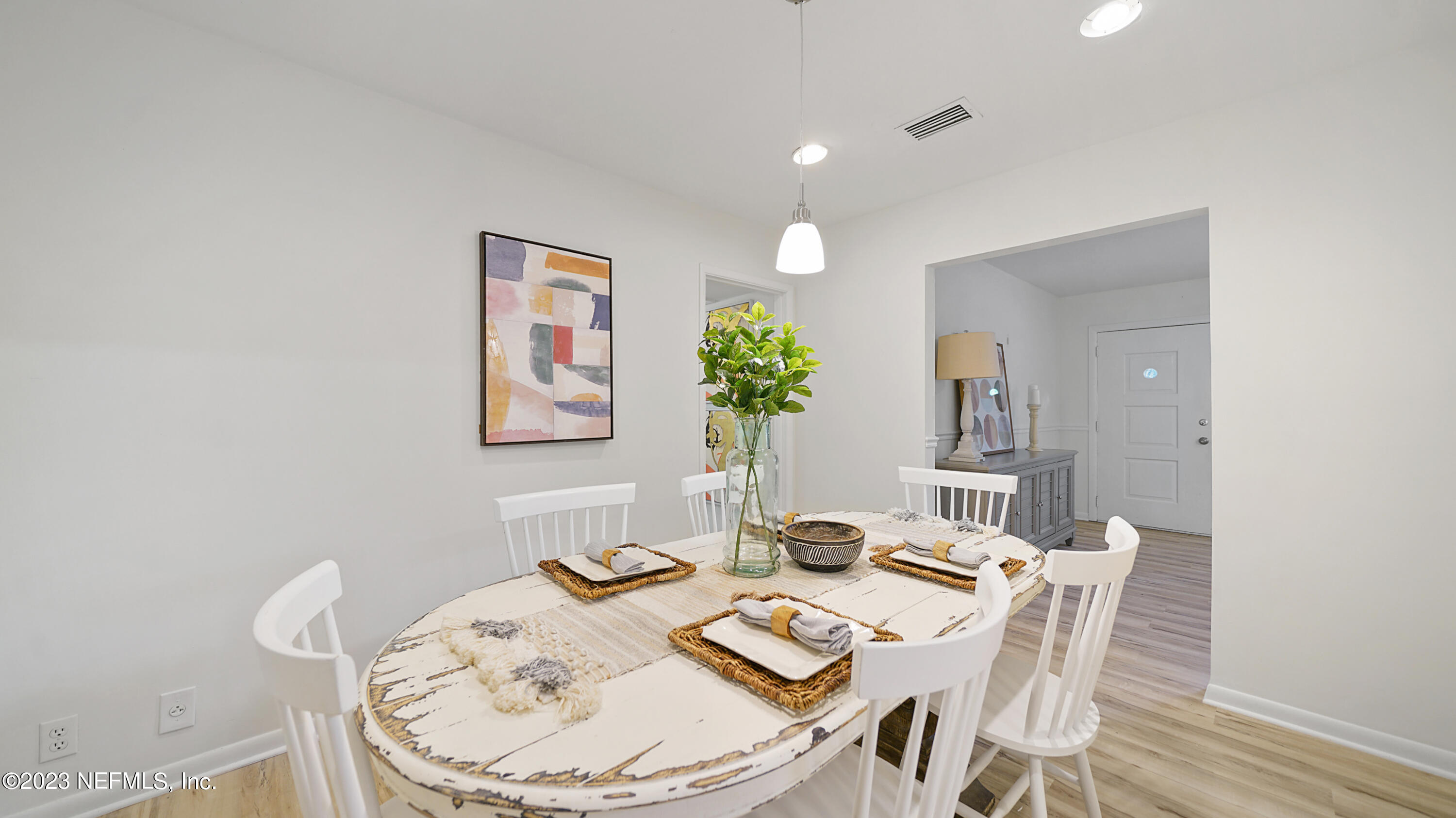 1130 Labelle Street Jacksonville, FL 32205 - Photo 15 of 24 a view of a dining room with furniture and wooden floor