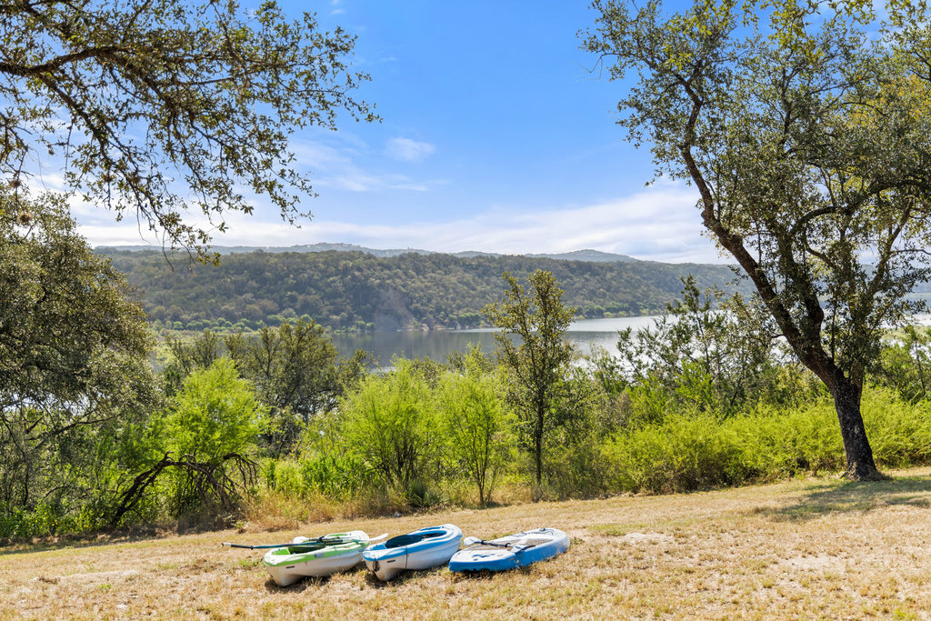 111 Swift Water Road Marble Falls, TX 78654 - Photo 20 of 37 a view of a yard with a tree