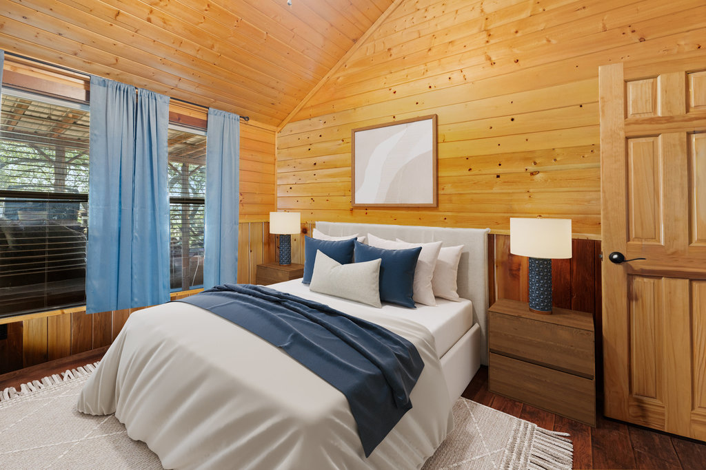 111 Swift Water Road Marble Falls, TX 78654 - Photo 33 of 37 a bedroom with a bed and a window