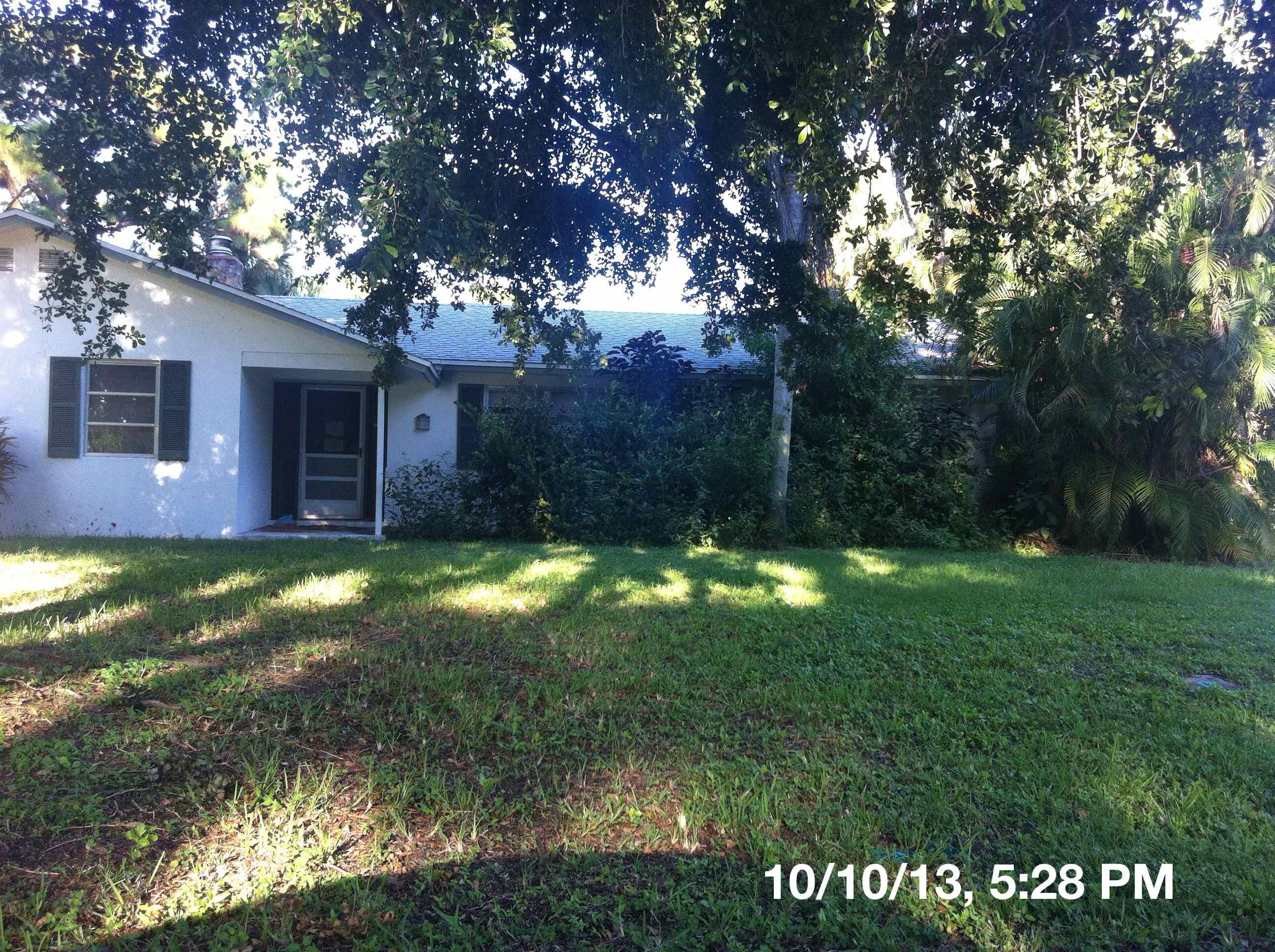 18438 Limestone Road Jupiter, FL 33458 - Photo 1 of 19 front