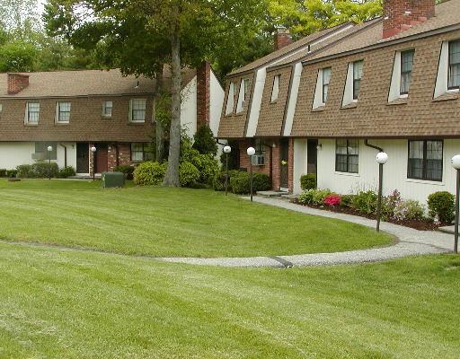 47 Homestead Lane, Unit 47 Brookfield, CT 06804 - Photo 1 of 1 a front view of a house with a garden
