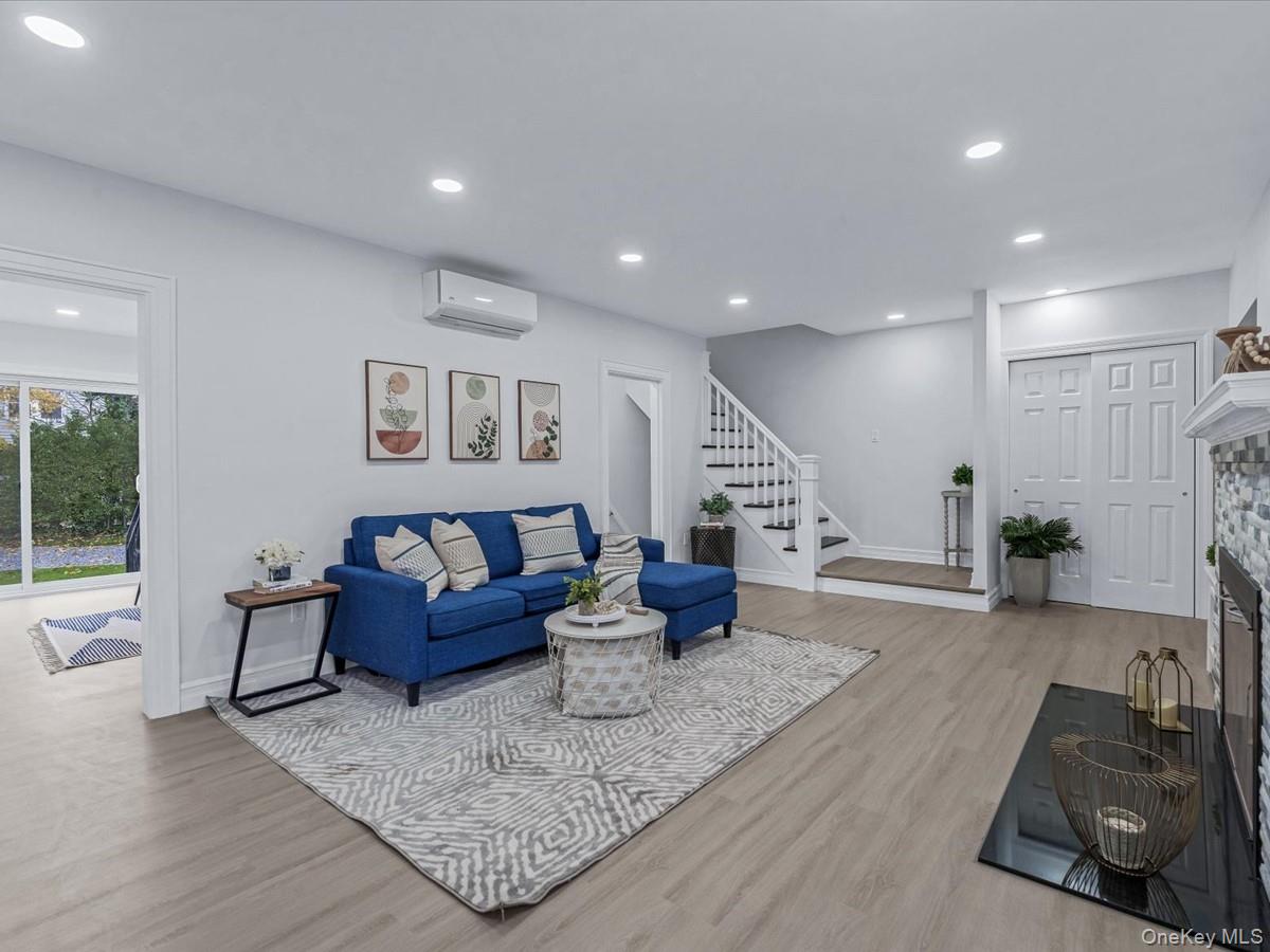 62 Essex Road Great Neck, NY 11023 - Photo 4 of 25 a living room with furniture and wooden floor