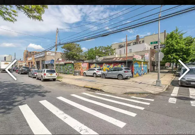 a view of a street with cars