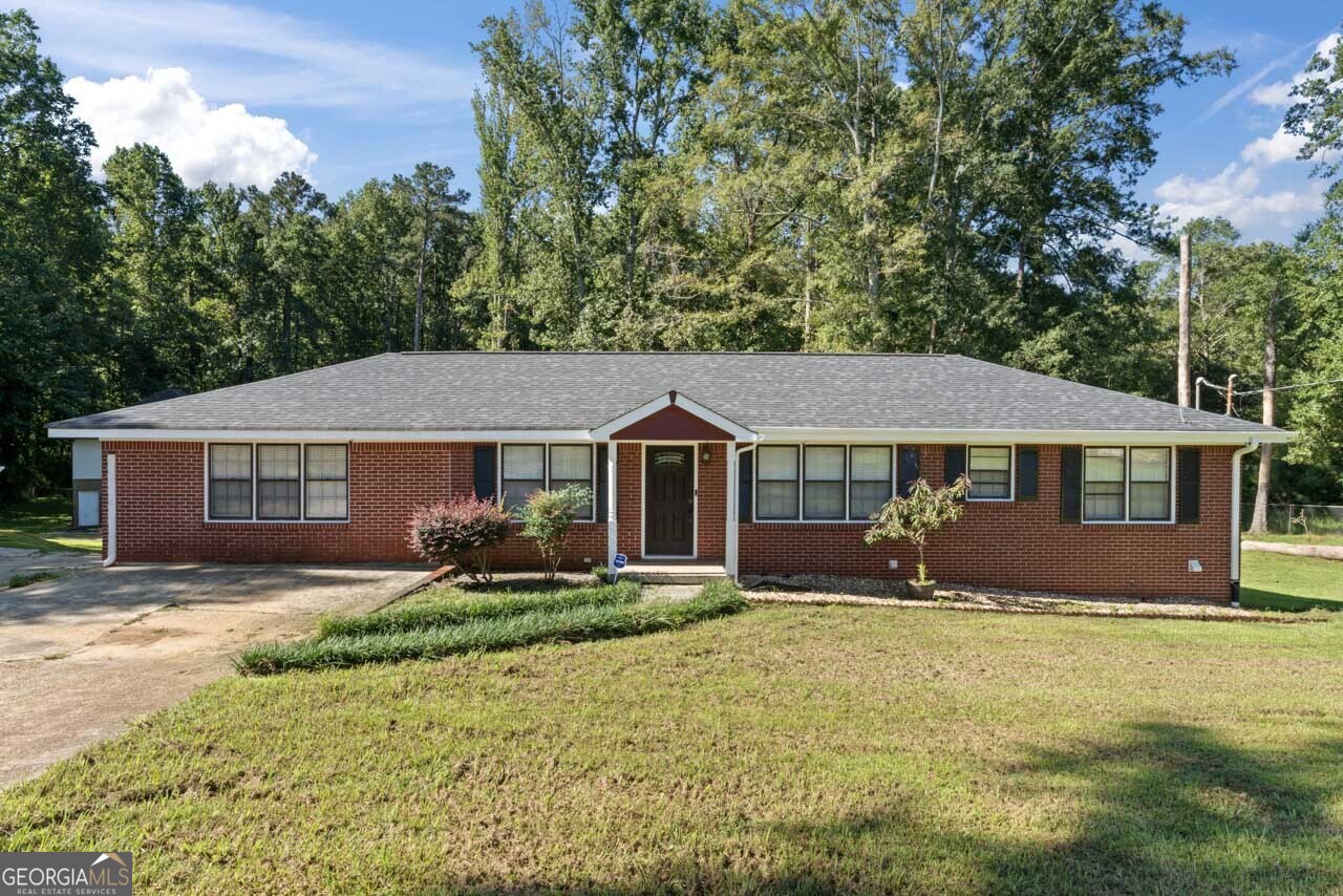 515 Valley Hill Road Stockbridge, GA 30281 - Photo 1 of 44 a front view of a house with a yard
