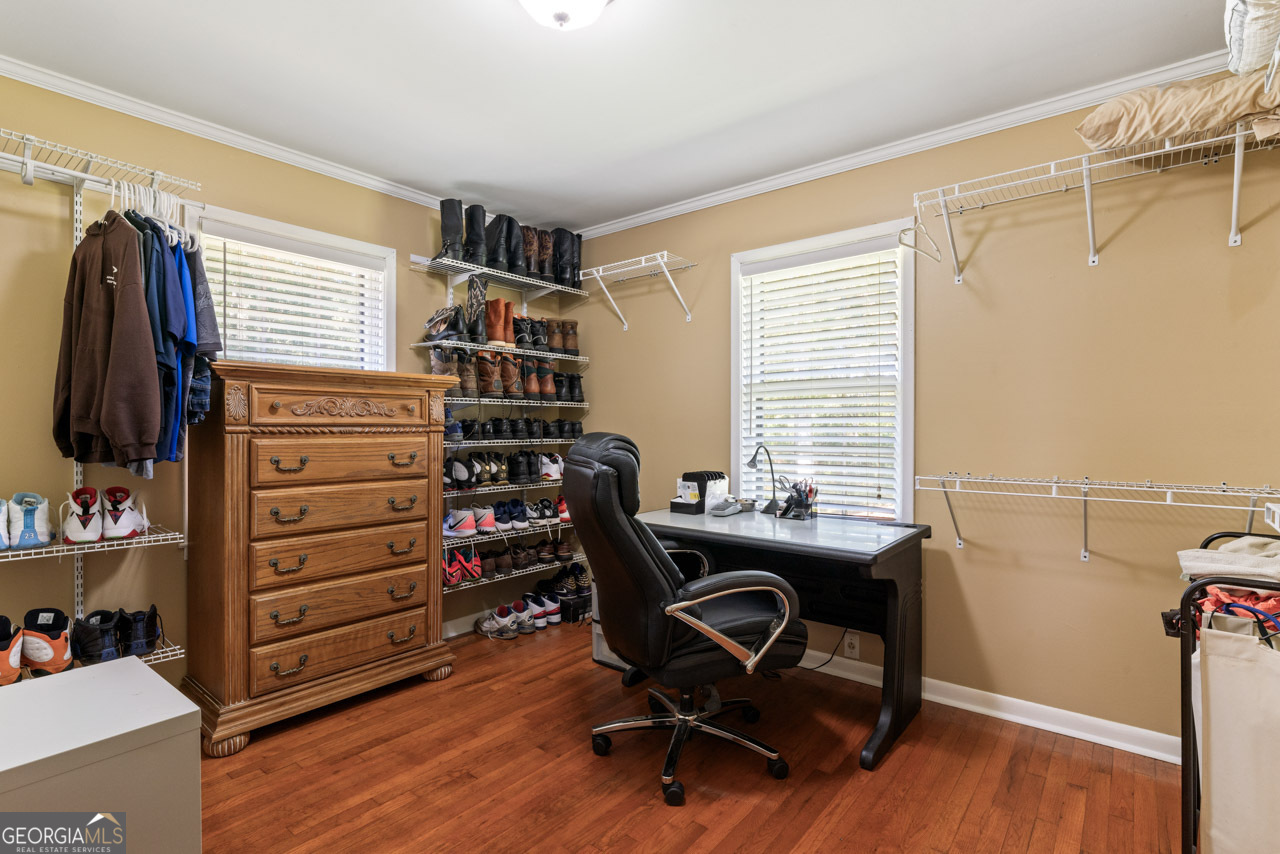 515 Valley Hill Road Stockbridge, GA 30281 - Photo 14 of 44 a view of a workspace with furniture and a window