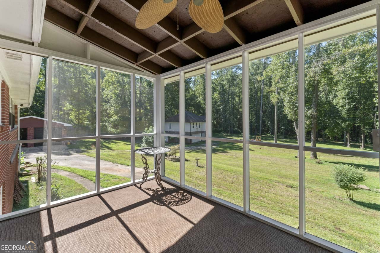 515 Valley Hill Road Stockbridge, GA 30281 - Photo 18 of 44 a view of a swimming pool with a porch