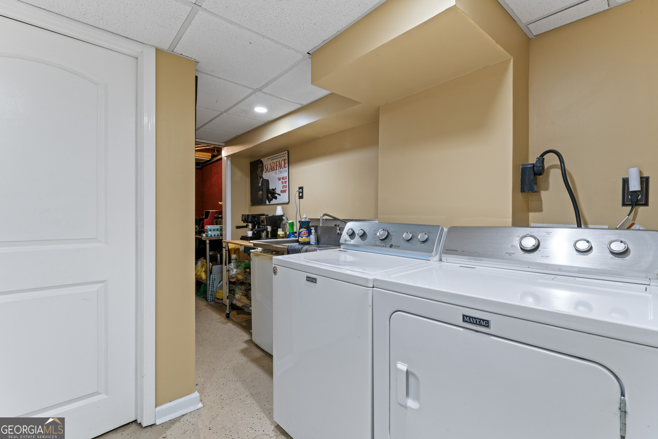 515 Valley Hill Road Stockbridge, GA 30281 - Photo 30 of 44 a utility room with dryer and washer