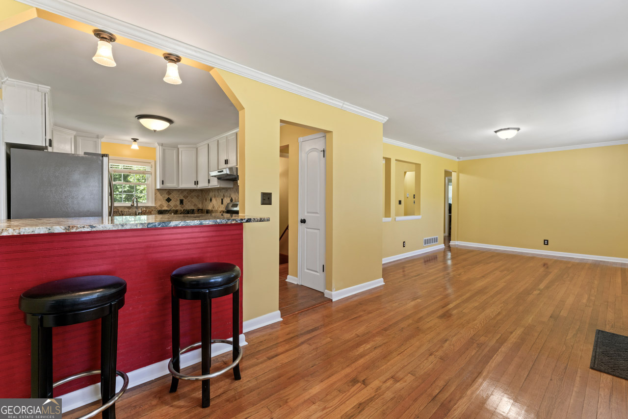 515 Valley Hill Road Stockbridge, GA 30281 - Photo 6 of 44 a view of kitchen with a table and chairs