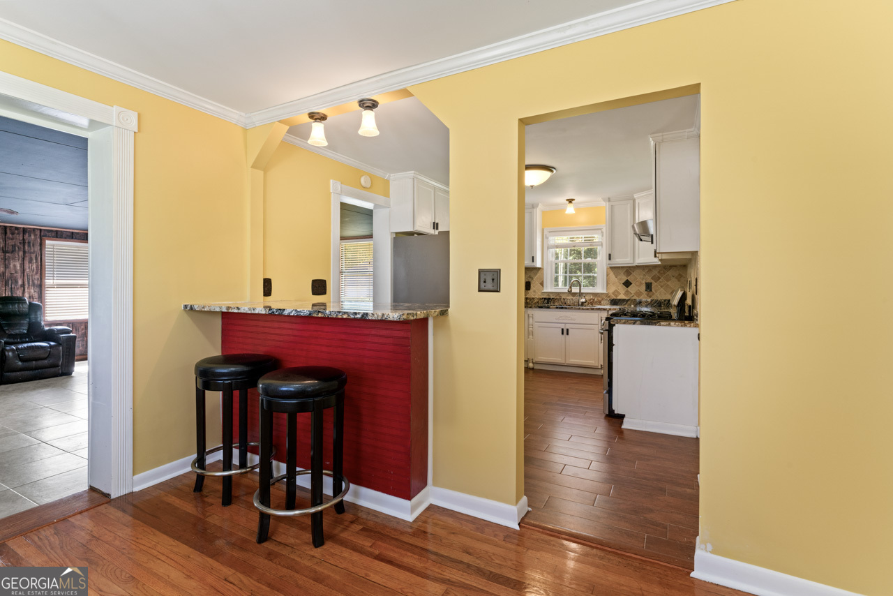 515 Valley Hill Road Stockbridge, GA 30281 - Photo 7 of 44 a view of living room with furniture and wooden floor