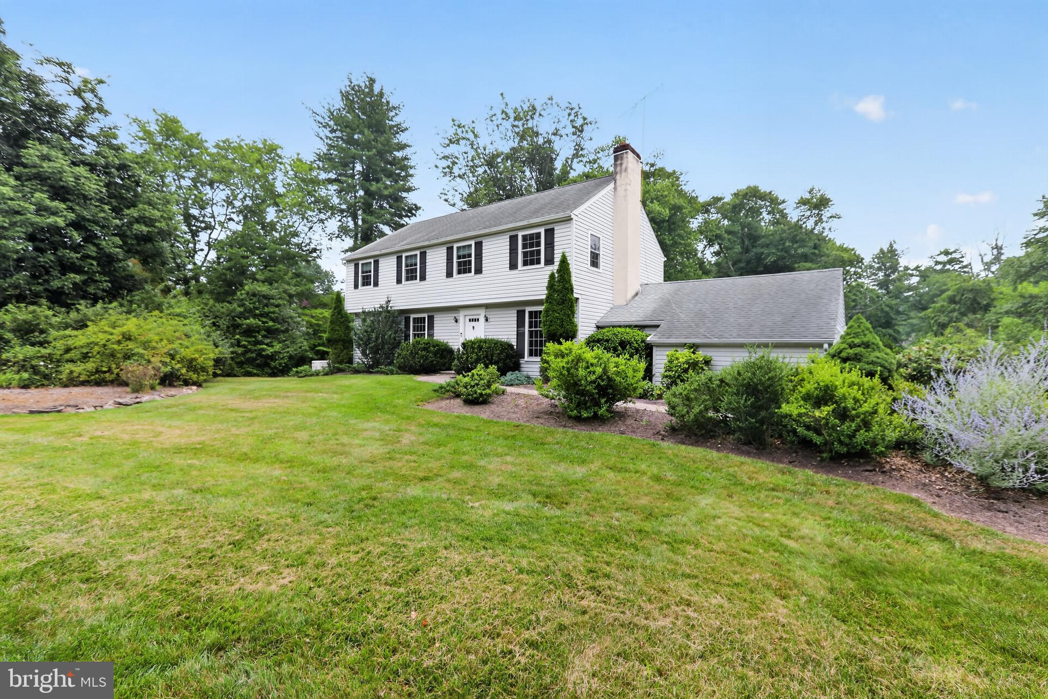 1408 Ponds Edge Road West Chester, PA 19382 - Photo 2 of 53 a front view of a house with a yard