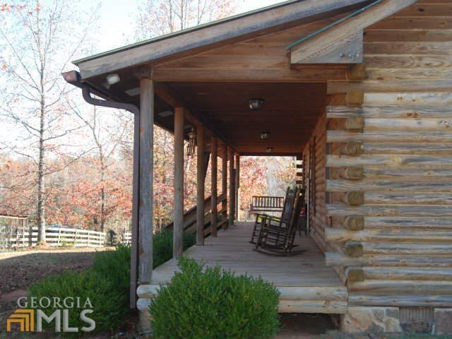 1510 Mobley Bridge Road Hogansville, GA 30230 - Photo 1 of 1 Contemporary log Home Sit on porch