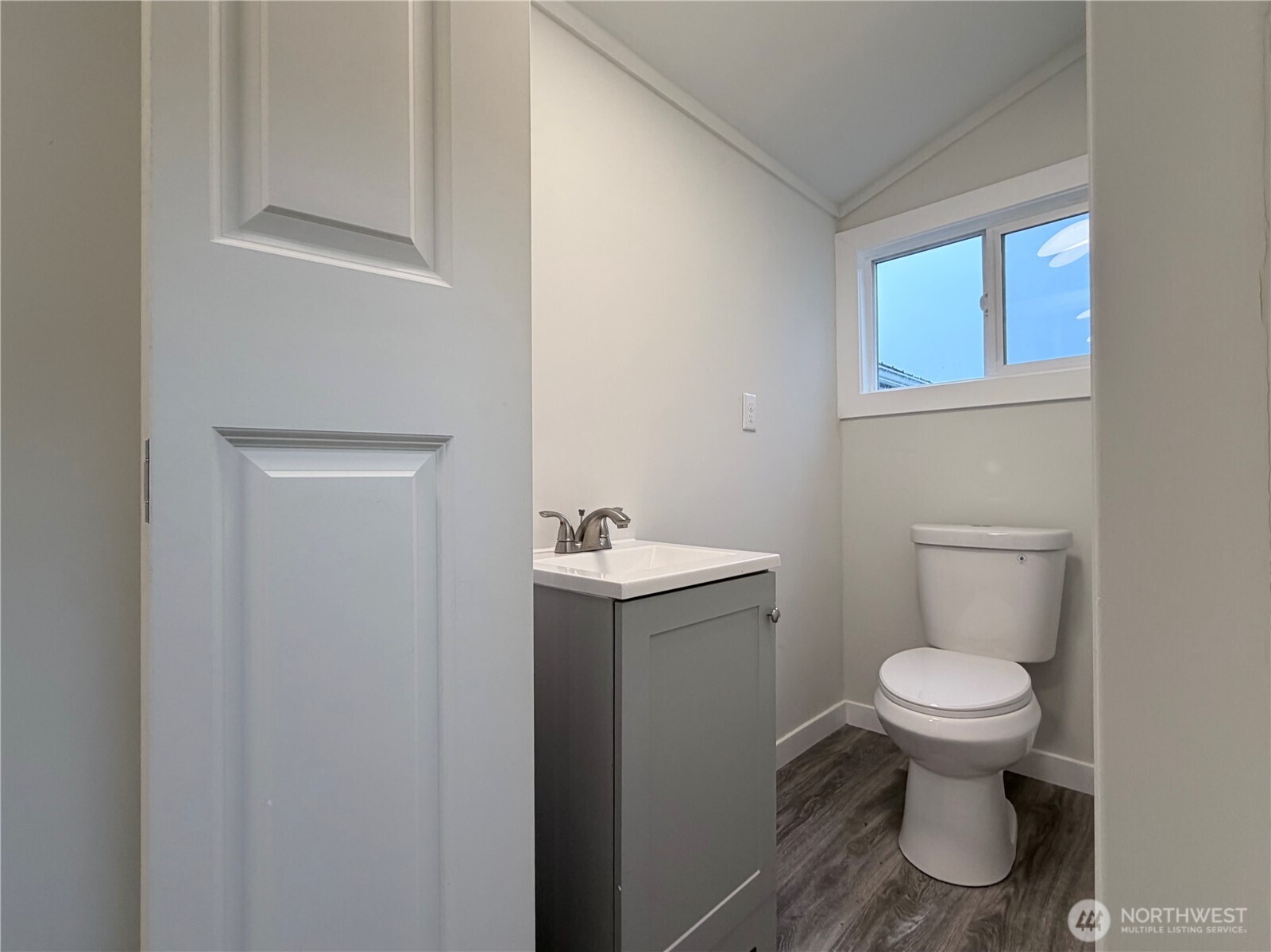 18501 52nd Avenue West, Unit 84 Lynnwood, WA 98037 - Photo 19 of 32 a bathroom with a toilet sink and mirror
