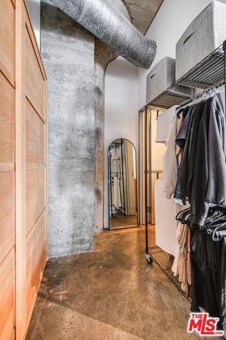 a lobby with furniture and window