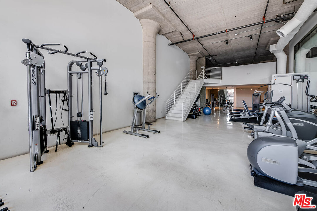 1855 Industrial Street, Unit 703 Los Angeles, CA 90021 - Photo 23 of 51 a view of a room with gym equipment