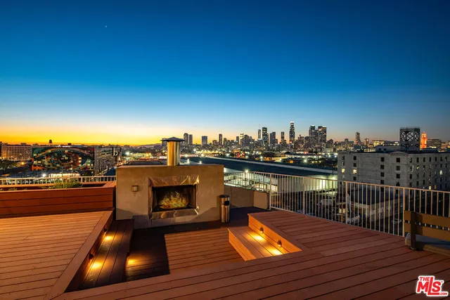 a patio with a table and chairs