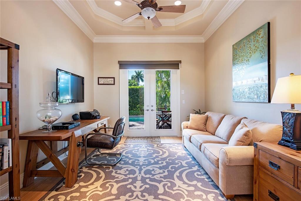1448 Marlin Drive Naples, FL 34102 - Photo 11 of 23 a living room with furniture and a window