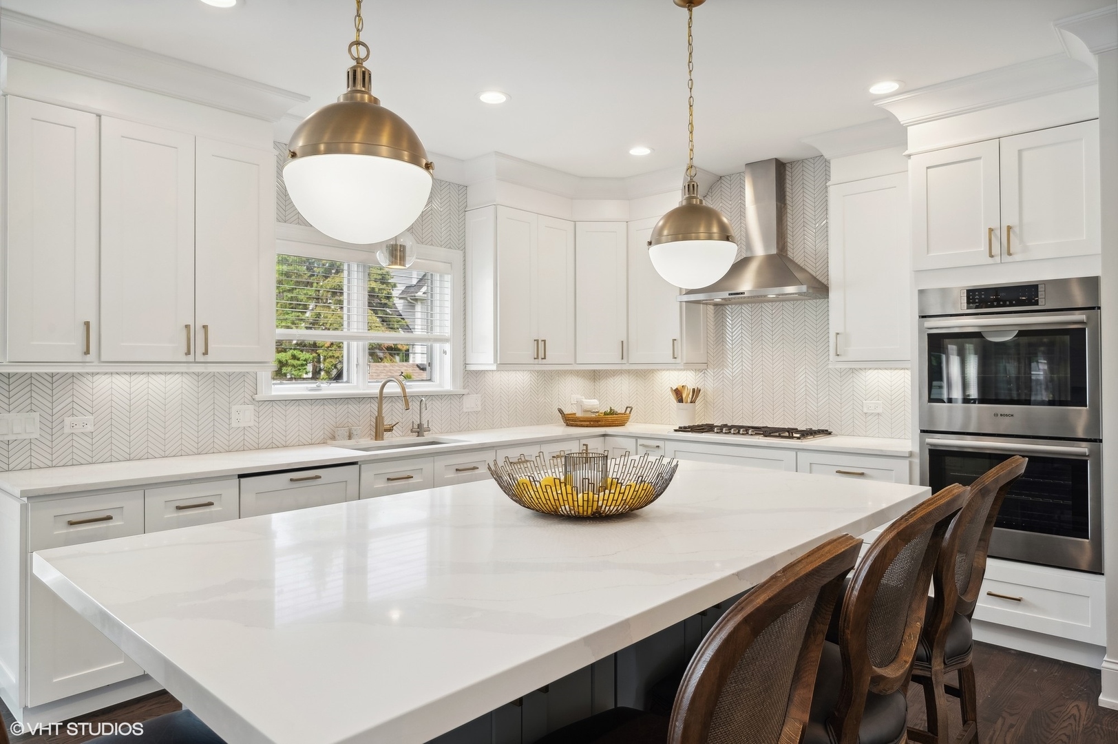 1770 Harrison Street Glenview, IL 60025 - Photo 11 of 40 a kitchen with stainless steel appliances granite countertop a sink a stove a dining table and chairs