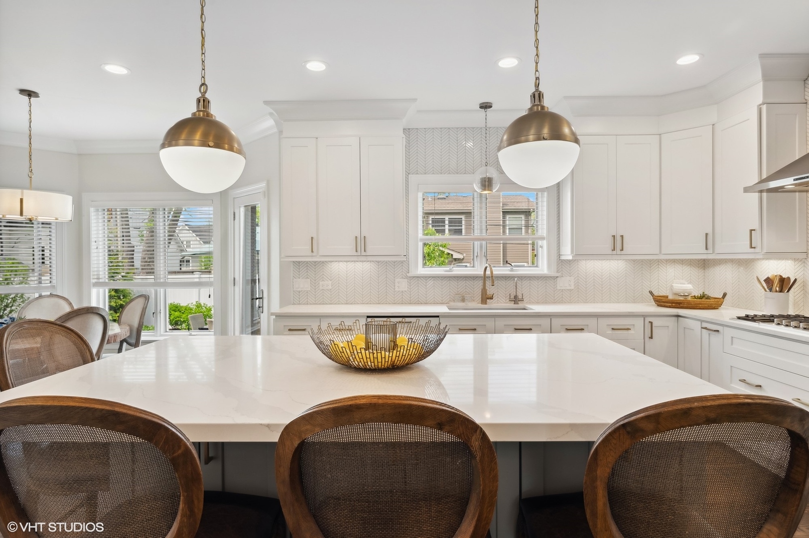 1770 Harrison Street Glenview, IL 60025 - Photo 12 of 40 a kitchen with a table chairs sink and cabinets
