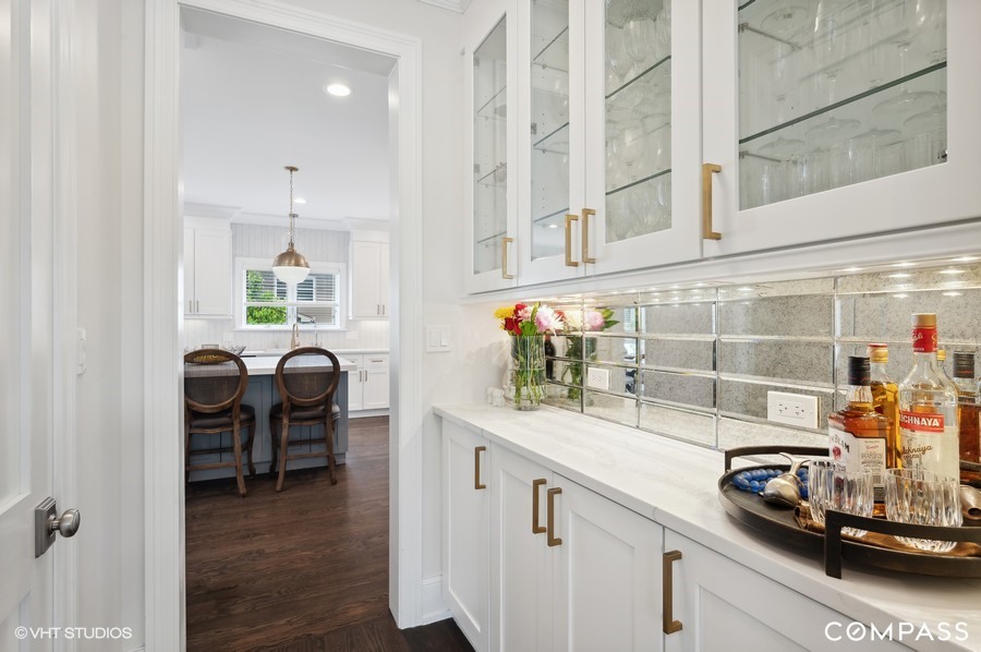 1770 Harrison Street Glenview, IL 60025 - Photo 14 of 40 a kitchen with a sink and a stove next to a window