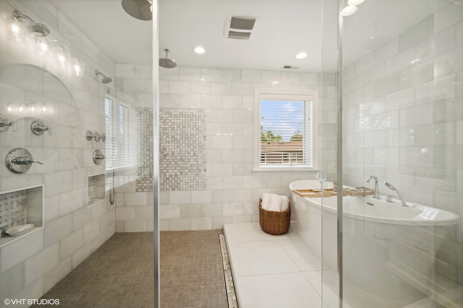 1770 Harrison Street Glenview, IL 60025 - Photo 22 of 40 a bathroom with a tub sink shower and mirror
