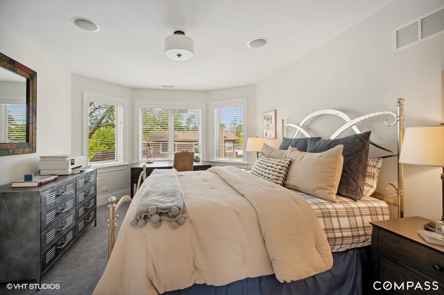 1770 Harrison Street Glenview, IL 60025 - Photo 24 of 40 a bed room with a bed and a large window