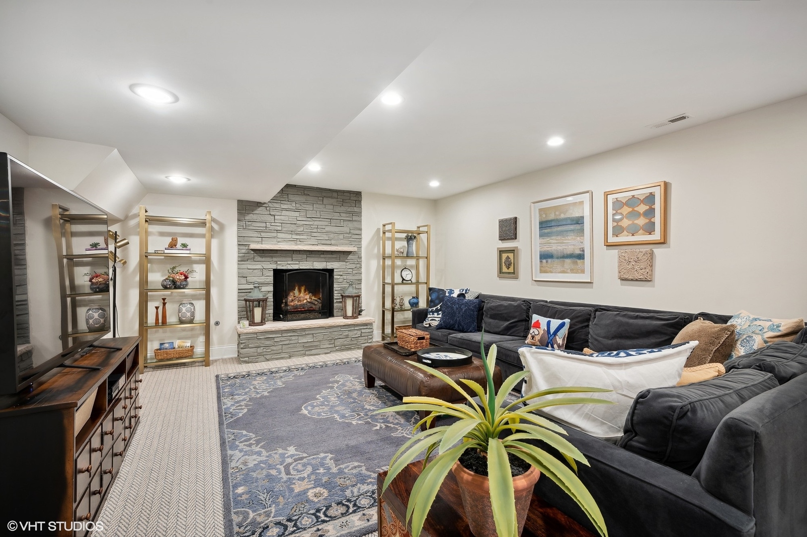 1770 Harrison Street Glenview, IL 60025 - Photo 29 of 40 a living room with furniture a fireplace and a flat screen tv