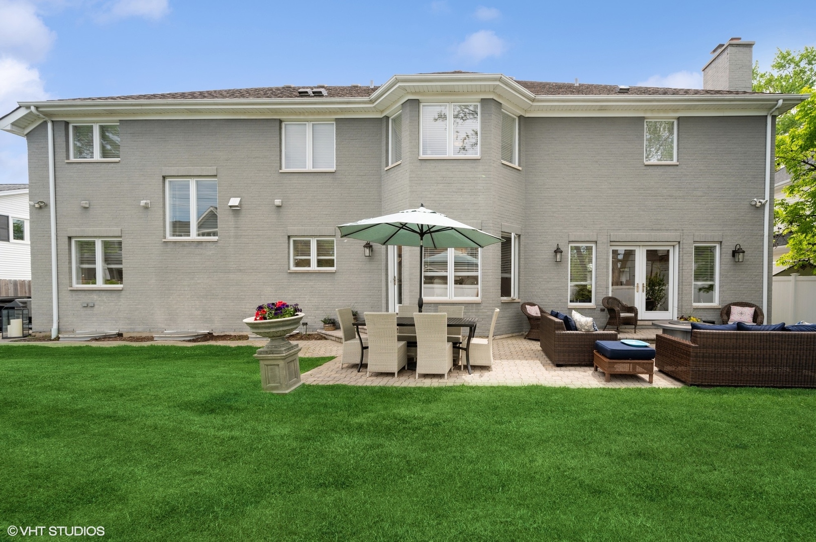 1770 Harrison Street Glenview, IL 60025 - Photo 35 of 40 a front view of a house with garden