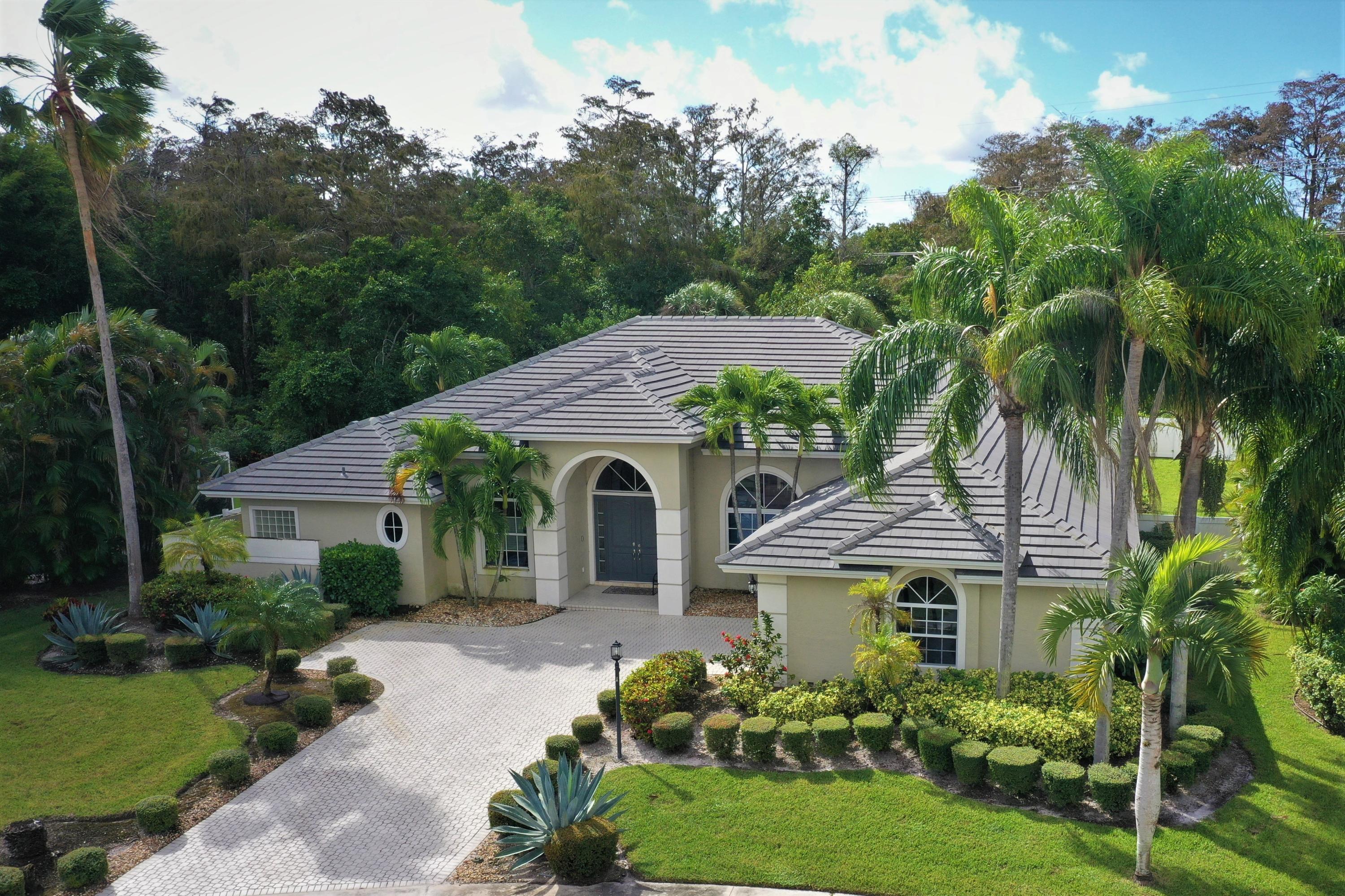 10570 Harich Lane Boca Raton, FL 33498 - Photo 2 of 27 Beautiful landscaping