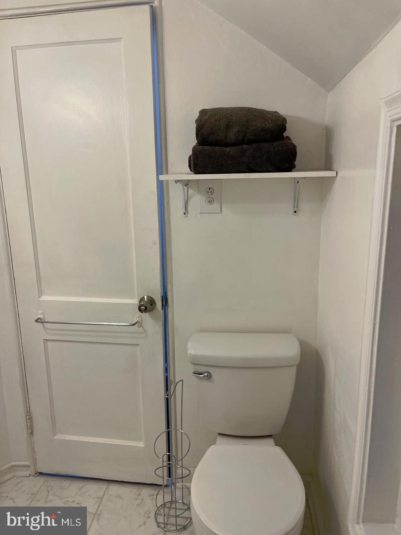 1077 South Edison Street Arlington, VA 22204 - Photo 23 of 29 a bathroom with a toilet and a vanity