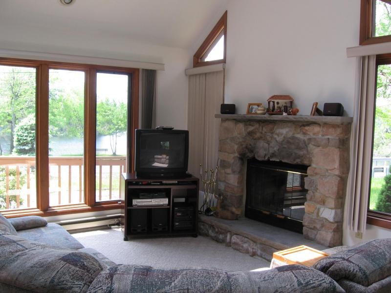 1101 Long Pond Road Long Pond, PA 18334 - Photo 8 of 15 a living room with furniture a flat screen tv and a fireplace