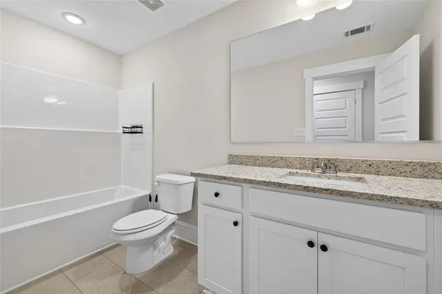 a view of a room with wooden floor and floor to ceiling window