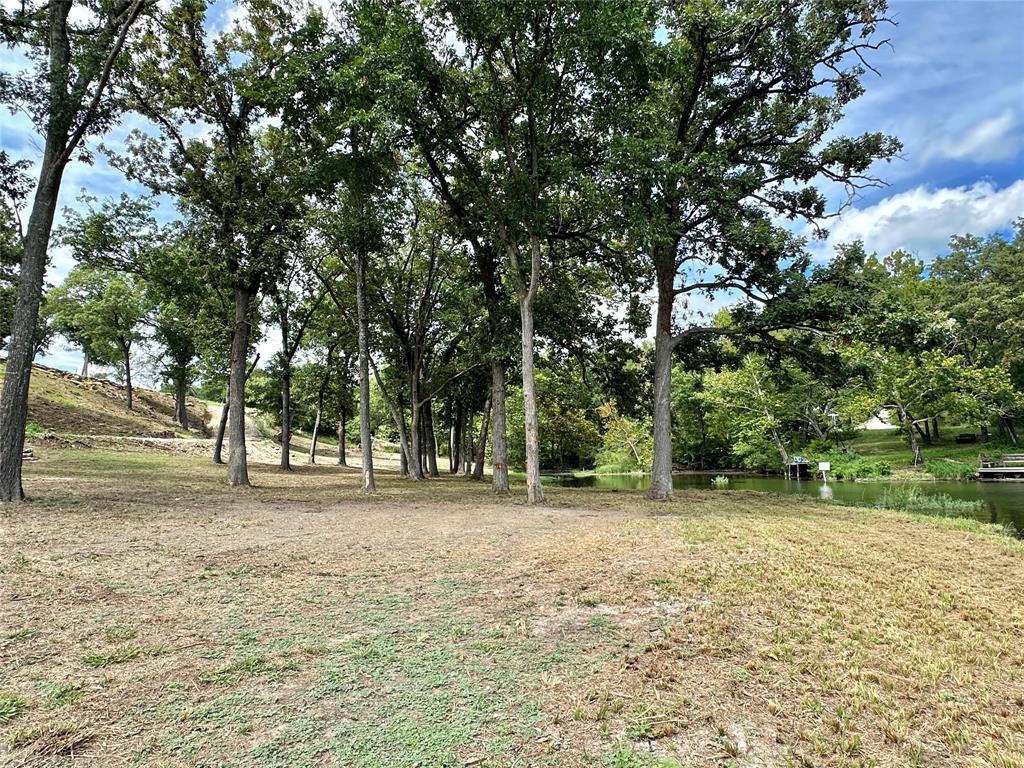 Tbd North Harrell Road Gainesville, TX 76240 - Photo 13 of 29 a view of a field with trees in the background