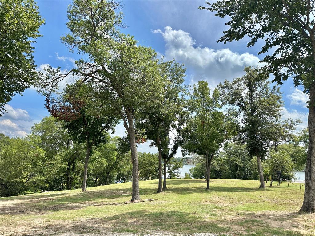 Tbd North Harrell Road Gainesville, TX 76240 - Photo 23 of 29 a view of a fountain with tree in the background