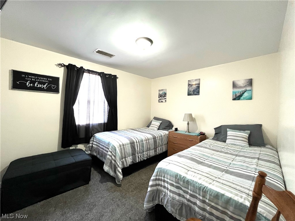 4972 West Fremont Road Port Clinton, OH 43452 - Photo 13 of 29 Bedroom featuring dark carpet