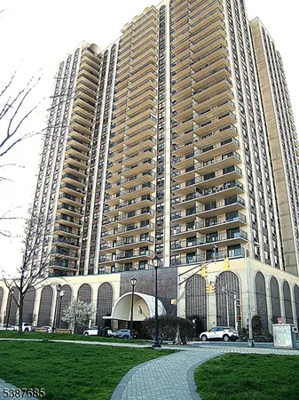 a front view of a building with glass windows