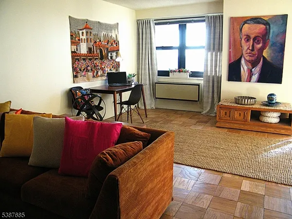 a living room with furniture and window