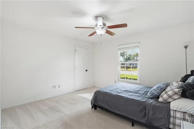 a bathroom with a shower and a toilet